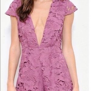 Super cute and girly lace deep v  romper NWOT
